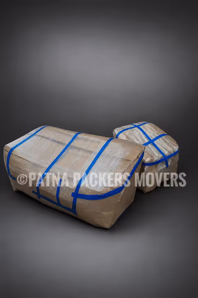Packing team wrapping furniture in Patna